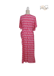 Brisa Coral – Vestido Largo con Hojas